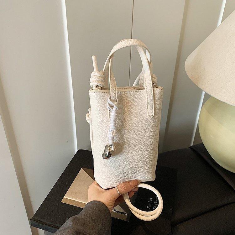 Casual niche design simple women's bag 2025 spring new fashion trend bucket bag shoulder messenger bag