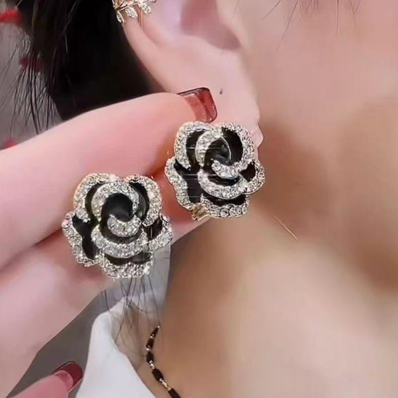 

Fancy Black S925 Sterling Silver Needle Ear Clip Camellia Black Stud Earrings