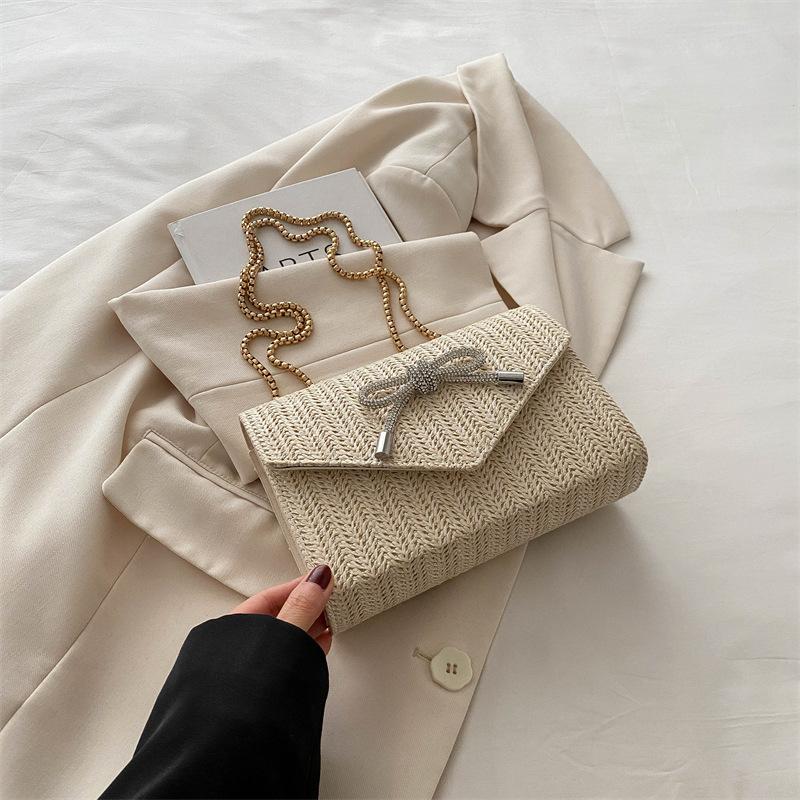 Trendy casual chain messenger bag beautiful bag 2025 summer new women's armpit bag straw woven personalized small square bag
