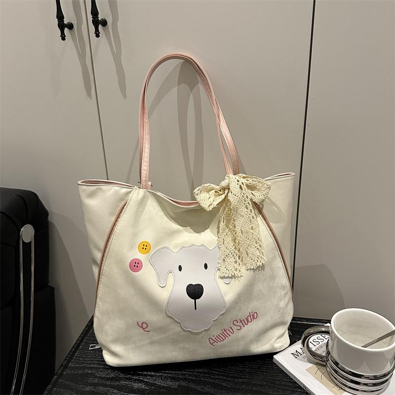 

Women s bag 2025 spring new popular commuter fashion cute dog pattern design shoulder crossbody bucket bag