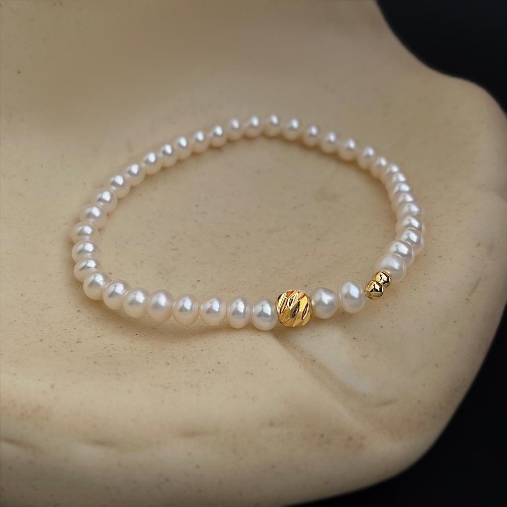 18k Gold Plated Freshwater Pearl Bracelet: Minimalist Geometric Design with Silver Beads.
