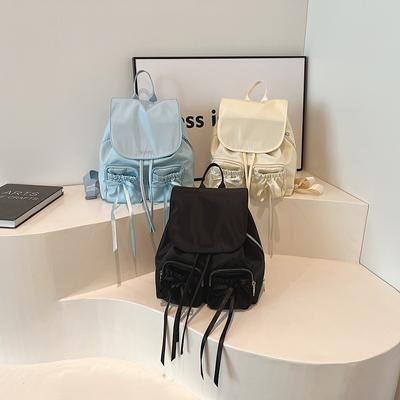Mochilas pequeñas de nailon con diseño de lazo para mujer, mochila de color sólido de moda coreana Y2K de invierno 2024, mochilas sencillas de viaje para mujer