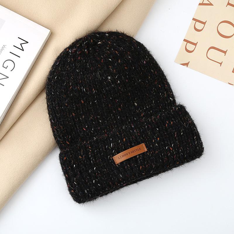 Autumn and winter pullover warm wool hat women's fashion leather label knitted confinement hat outdoor cycling sports hat