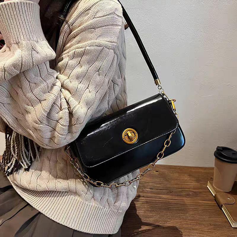 

Nanfeng Versatile Trendy Fashion Golden Autumn Roman Small Square Bag Women s 2025 New One-Shoulder Armpit Bag Commuter Crossbody Bag чёрный