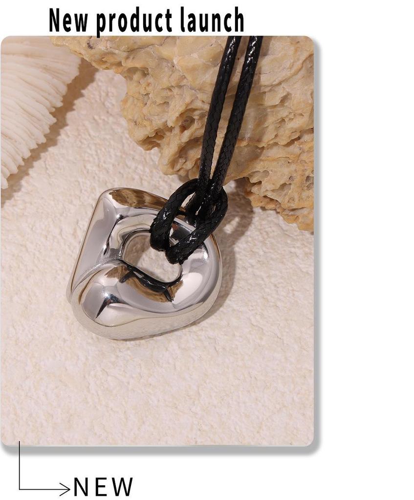 Qiong Yao Stainless Steel Curved Pendant Necklace with Black Leather Cord, Adjustable Length, Simple High-End Design for Women.