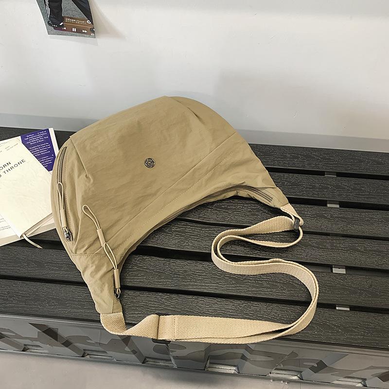 Crossbody bag women's dumpling small bag summer large capacity bag couple casual light sports canvas bag men