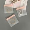 In-Stock Frosted Jewelry Bag: Portable EVA Storage for Earrings & Bracelets, Dustproof with Zipper & Buckle.
