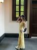 Yellow Strappy Summer Beach Dress: Elegant Ruffled French Style with Puff Sleeves and Cinched Waist