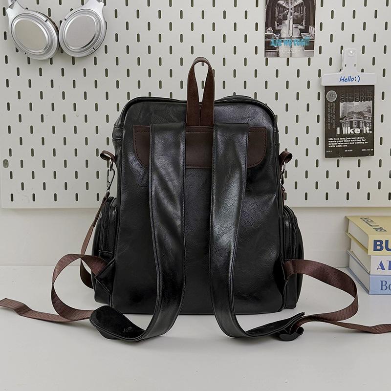Schoolbag European and American retro silver nail-trimmed backpack couple high street locomotive wind light and versatile class storage backpack