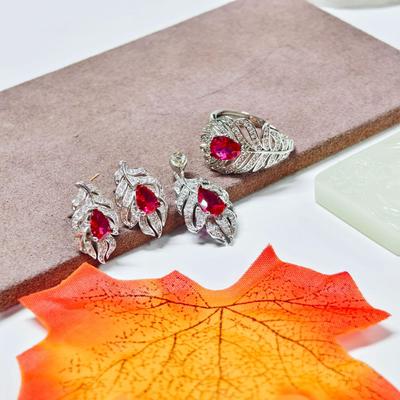 Gusien Jewelry: Exquisite Feather-Shaped Stud Earrings & Pendant Ring - Women's Elegant & Versatile Court Style.