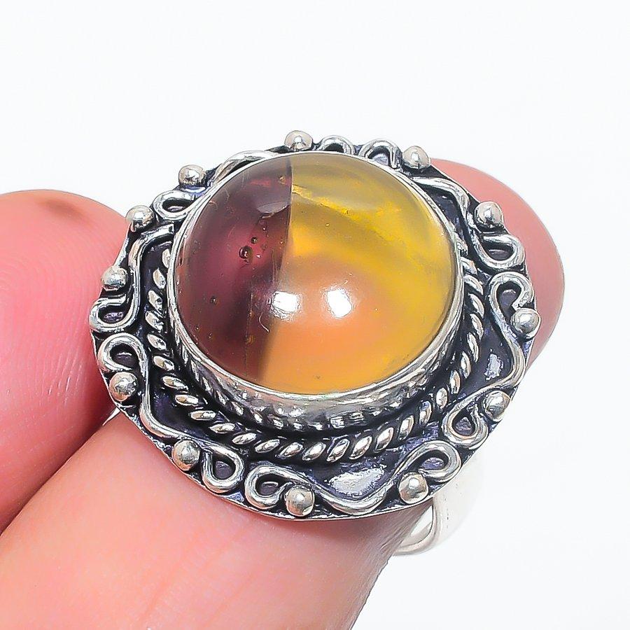 

Кольцо из серебра 925 пробы с натуральным флюоритом, размер 7 h3H70