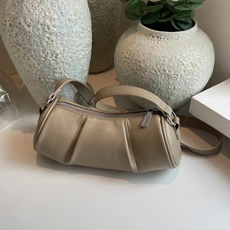 Retro cylindrical shoulder bag for women  crossbody bag  versatile cushion  solid color  high quality  niche  casual  new
