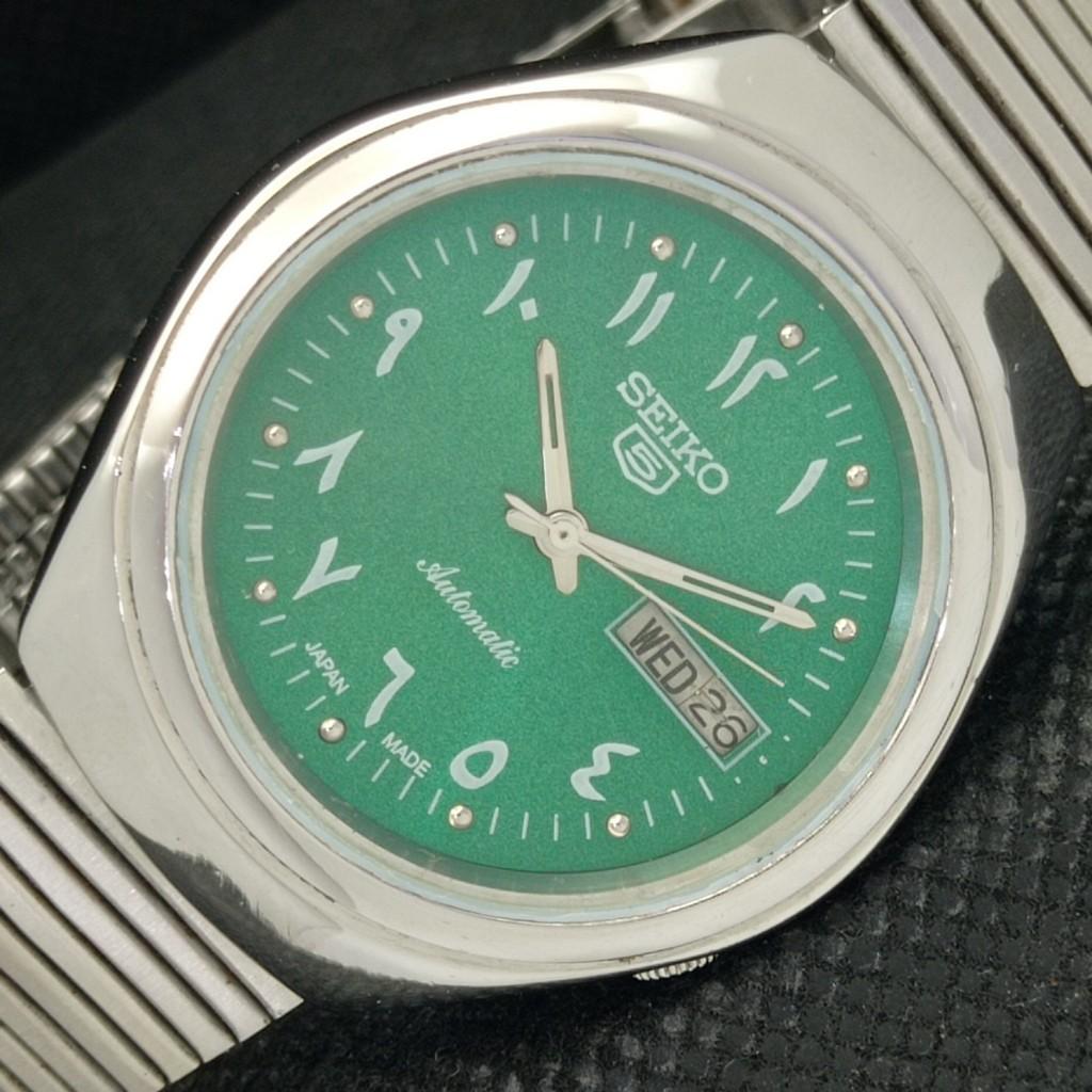 

Б/У винтажные часы SEIKO 5 AUTO 7009A JAPAN MENS D/D ARABIC GREEN WATCH 589-a310818-9 SKU589-a310818
