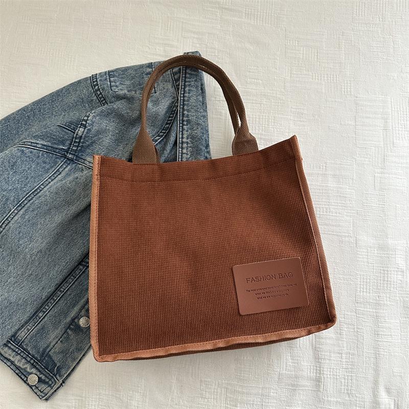 2025 summer new literary and artistic large-capacity class shoulder portable messenger bag casual simple canvas women's bag