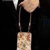 Applicable to Apple 17promax mobile phone case iphone15 rose camellia doll lanyard 16 retro glacier pattern
