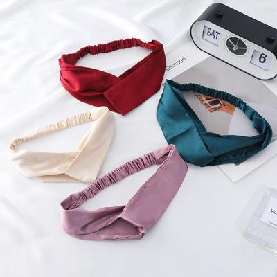 "Fascia Elastica in Seta Simulata": Chic, Comodo, & Design a Croce Monocolore"