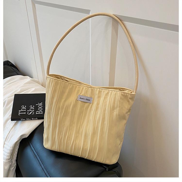 

Canvas bag women s large-capacity new summer versatile casual popular shoulder underarm bucket bag жёлтый