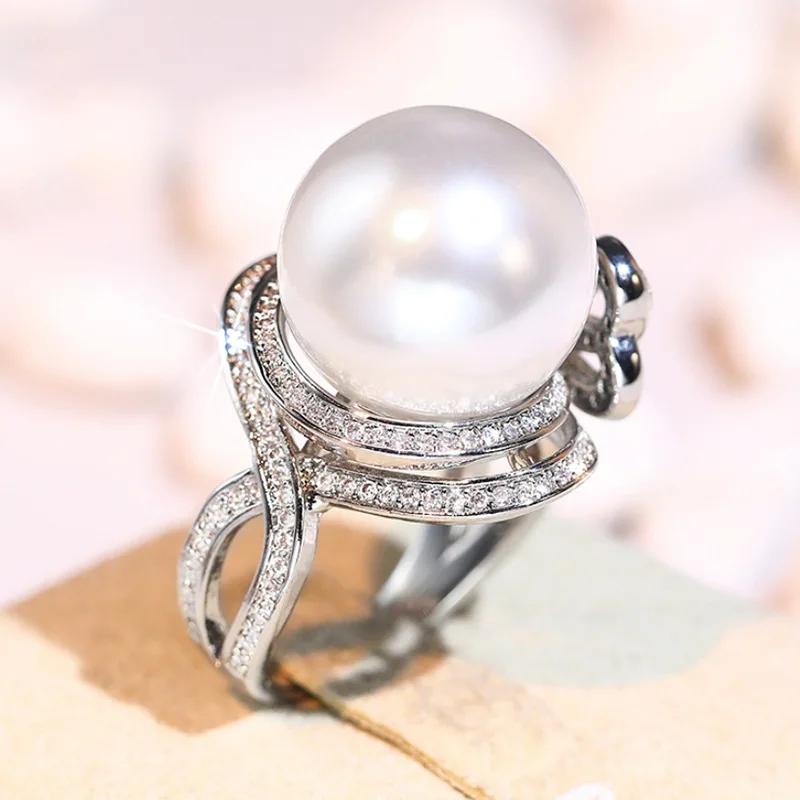 

2026 New European and American Light Luxury Style Small Fragrance Ring, Pearl Bow Design, Fashionable and Elegant Zircon 10
