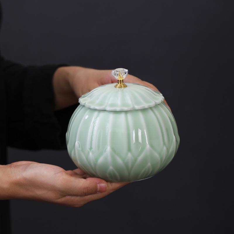 Celadon Ceramic Tea Canister: Large Half-Pound Capacity Storage for Green or Black Tea - Porcelain Sealing Jar with Printed Design.