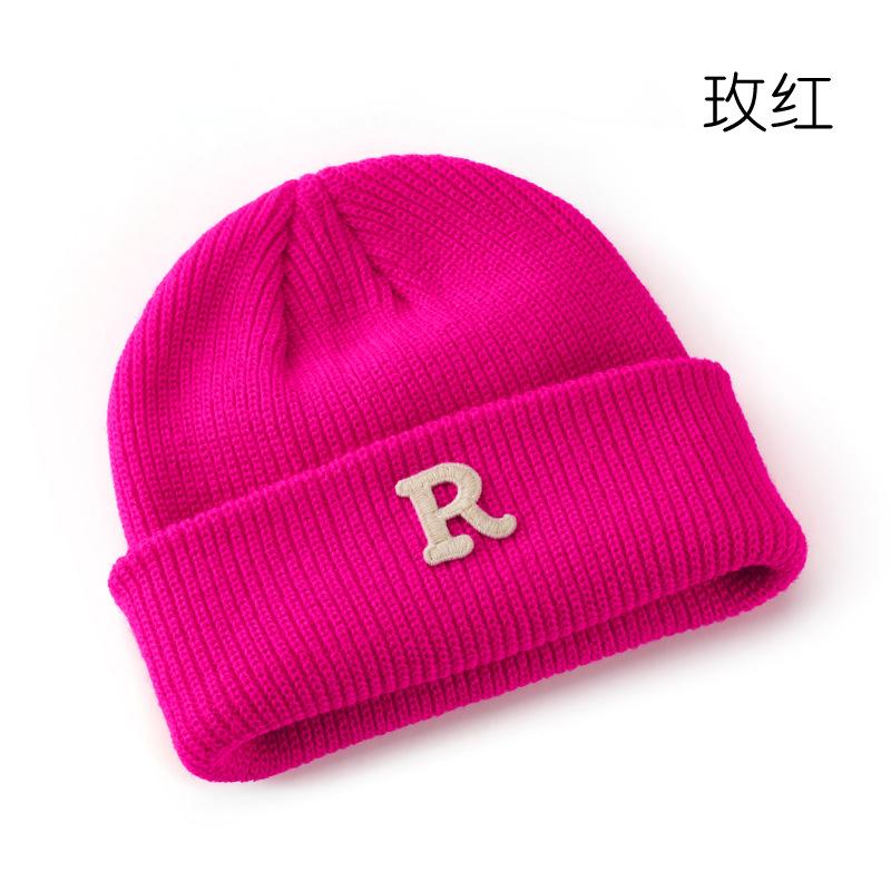 Women's Solid Color Letter Print R Rolled brim knitted hat for outdoor cycling, providing warmth, cold protection, and ear coverage