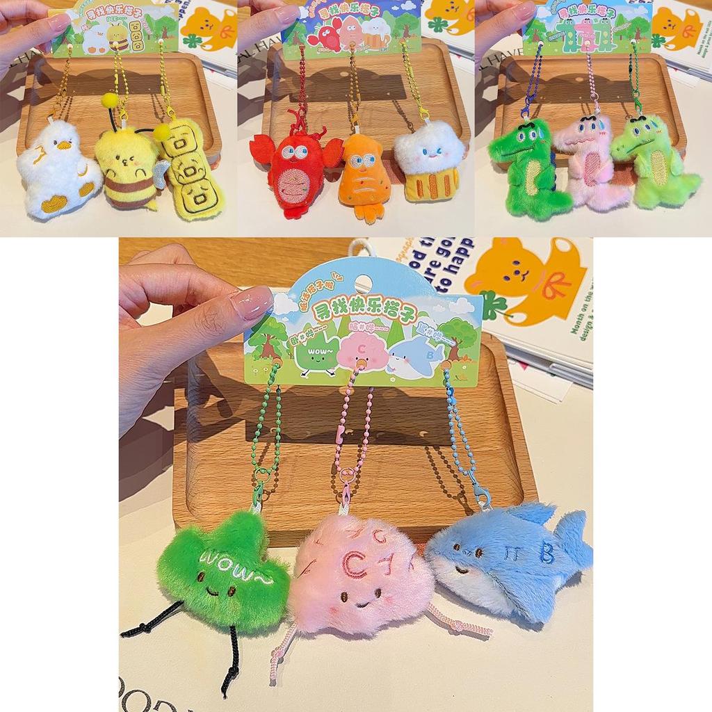 Jinnew Mini Plüsch Schlüsselanhänger mit niedlichem Stickdesign zur Taschenverzierung
