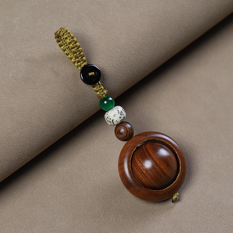 

Rosewood Car Keychain and Mobile Phone Bag Pendant with Luminous Bead and Rotating Retro Green Sandalwood Ornament