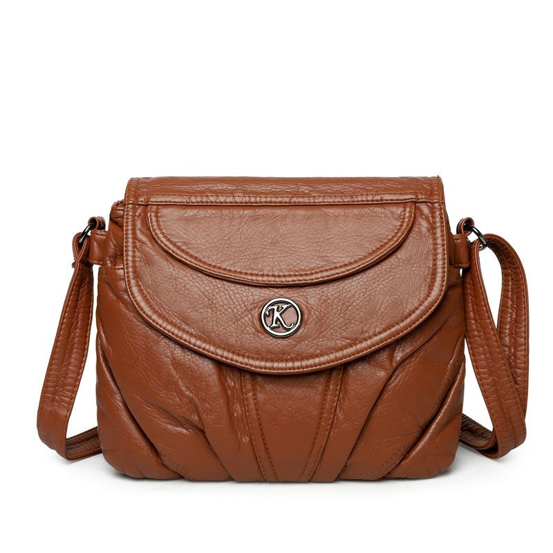 

Chic PU Leather Crossbody Bag for Women – Soft Texture with Metal Logo Accent and Adjustable Strap, Perfect for Daily Use коричневий