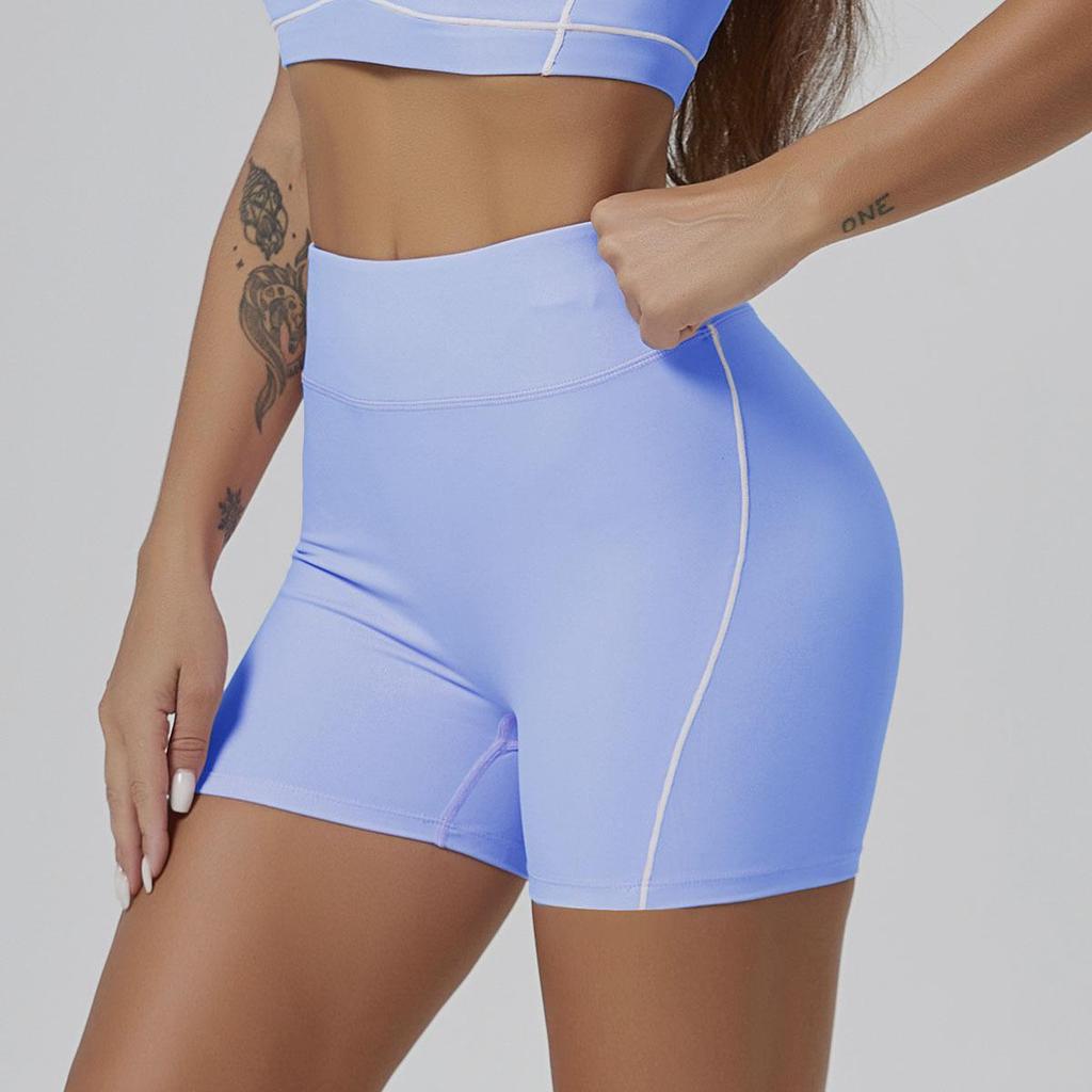 Yoga-Set in Kontrastfarbe: Hochelastischer Sport-BH und ausgestellte Hose mit Hüftlifting