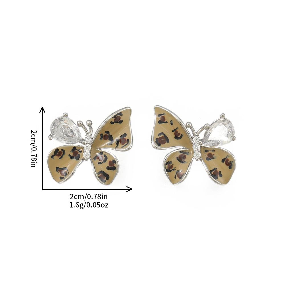GEMCHIC Women s Leopard Print Butterfly Stud Earrings with Crystal Accents