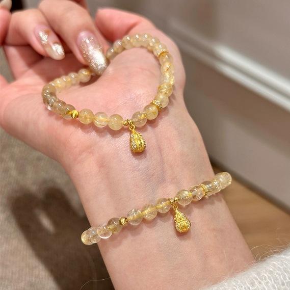 

Natural Golden Rutilated Quartz and Citrine Beaded Bracelet for Women with Gourd Pendant Natural
