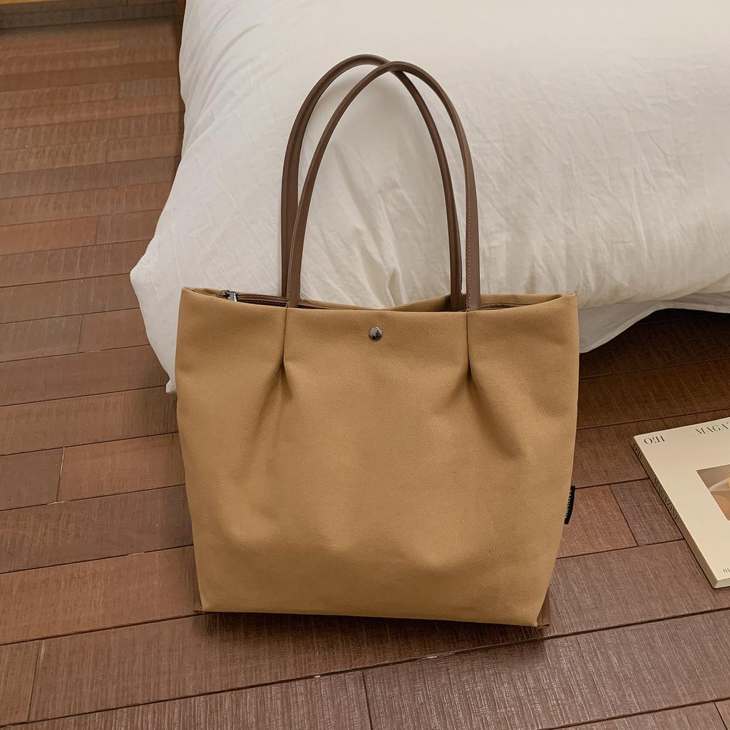Japanese Casual Canvas Bag Women's Large Capacity Lightweight Handbags 2026 New Solid Color Commuting Shoulder Bags