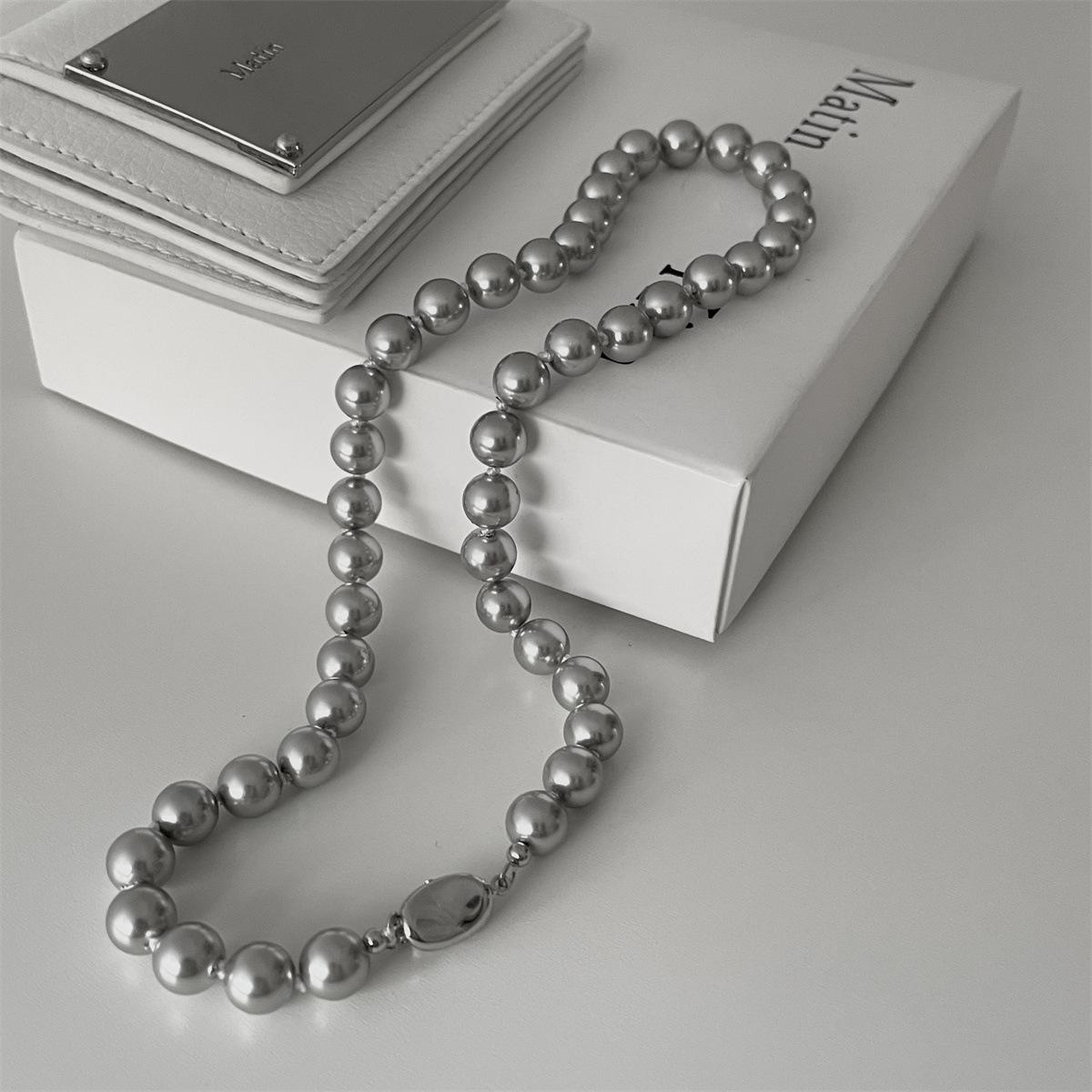 

Серый жемчуг Shijia ins модное универсальное индивидуальное ожерелье нишевая мода мужской и женский темперамент медное дно гальванизированная пуговица головка Imitation pearl