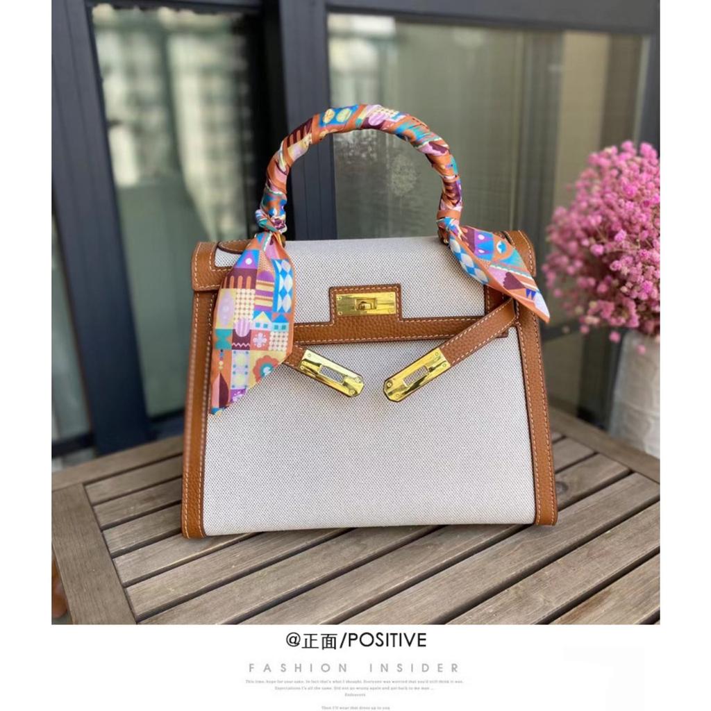 New temperament messenger bag women's canvas with leather bag contrasting color leather handbag fashion lock shoulder bag