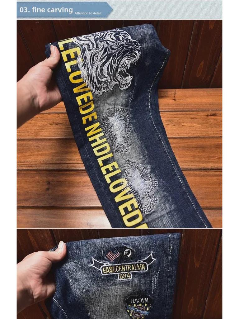 Men's Slim-Fit Embroidered Floral Distressed Jeans with Patches and Elastic Trim.