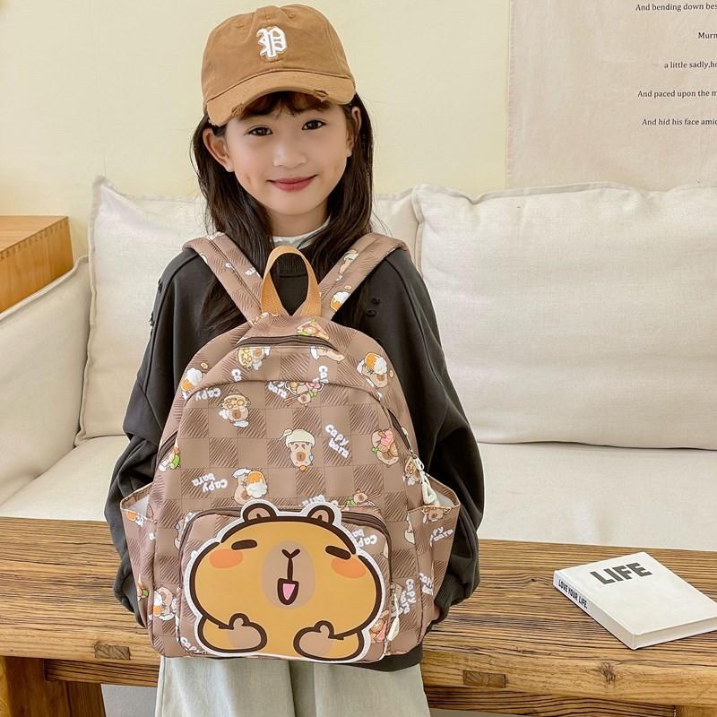 Vibrant Capybara Cartoon School Backpack For Children With Durable Nylon Material And Design Fun