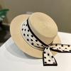 Elegant Lady Cowboy Straw Hat with Polka Dot Ribbon and Wide Brim for Women