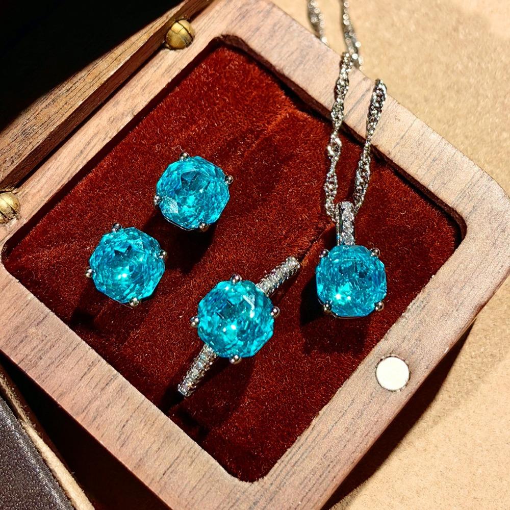 

Восьмиугольный кулон Paraiba с сверкающими бриллиантовыми серьгами Желтое золото Кольцо Женский набор ювелирных изделий