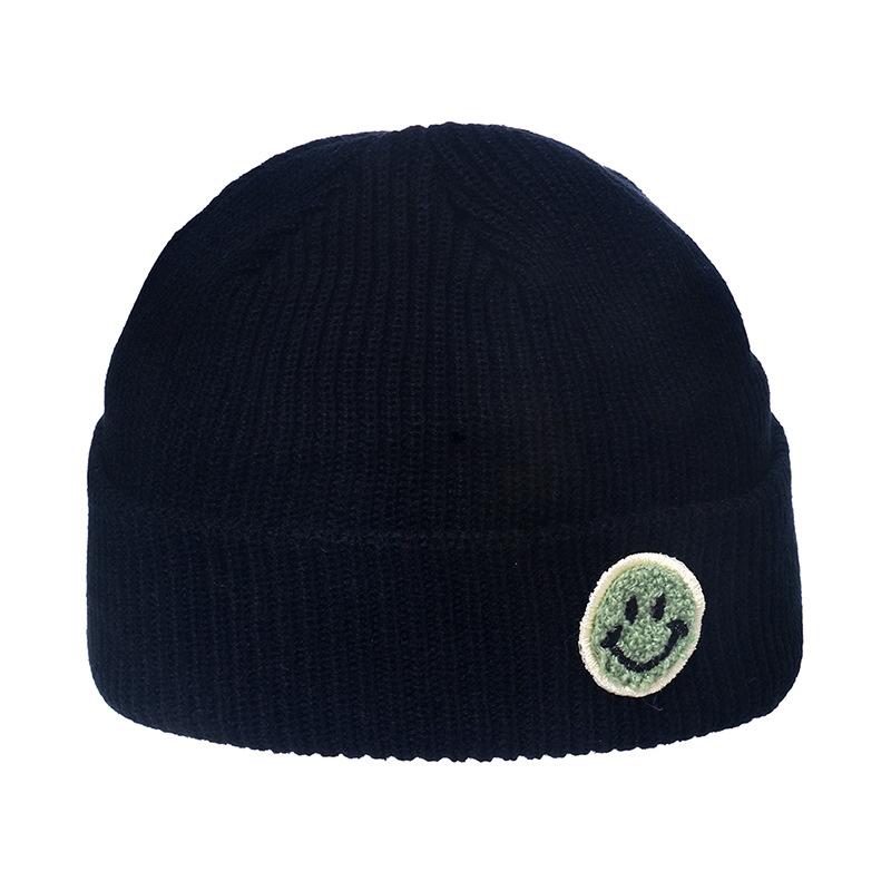 Autumn and winter wool hat male trend Japanese and Korean yuppie knitted warm smiley face sticker landlord hat candy color melon fur hat female