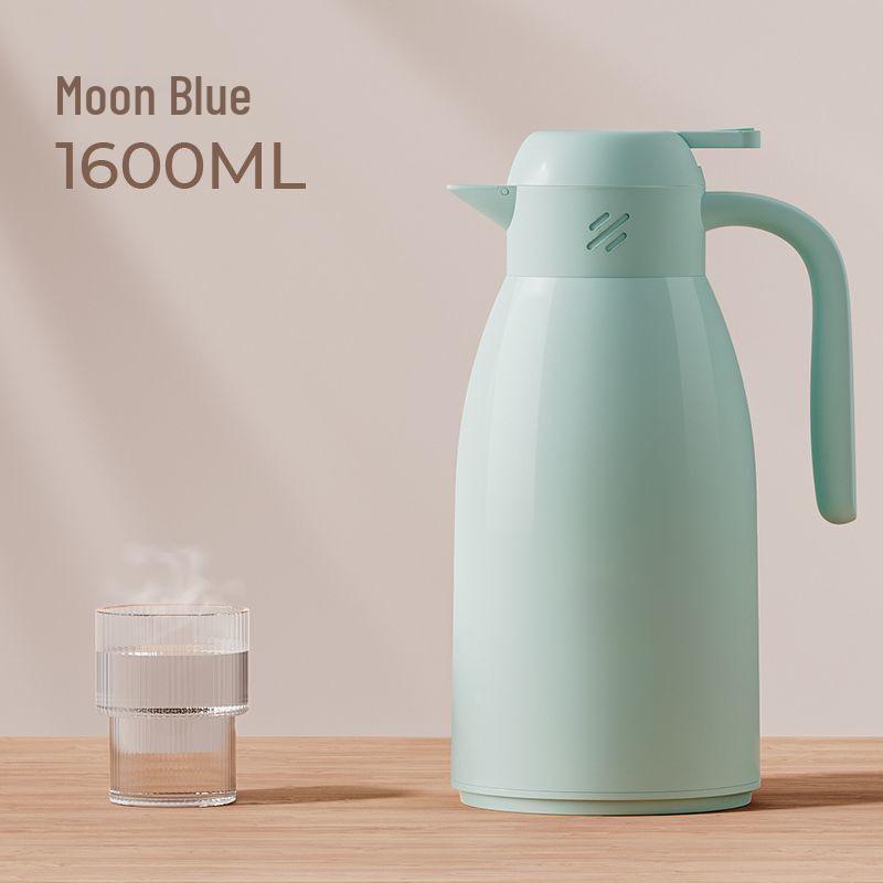 Press-Type Thermos Flask: Compact Glass-Lined Water Bottle with Hour-Long Insulation, Convenient Home Delivery.