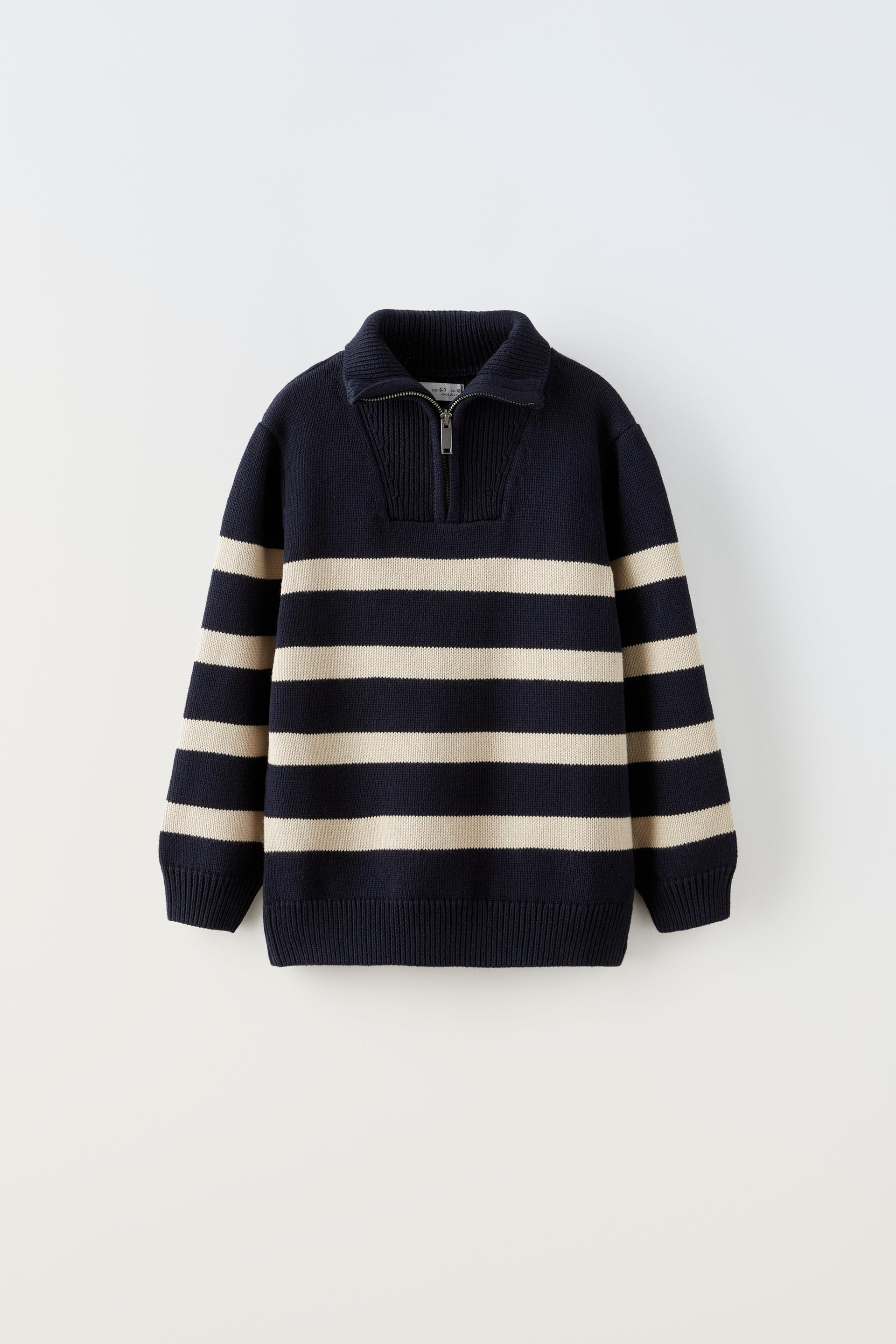 

ТРИКОТАЖНЫЙ СВИТЕР С ВЫРЕЗОМ