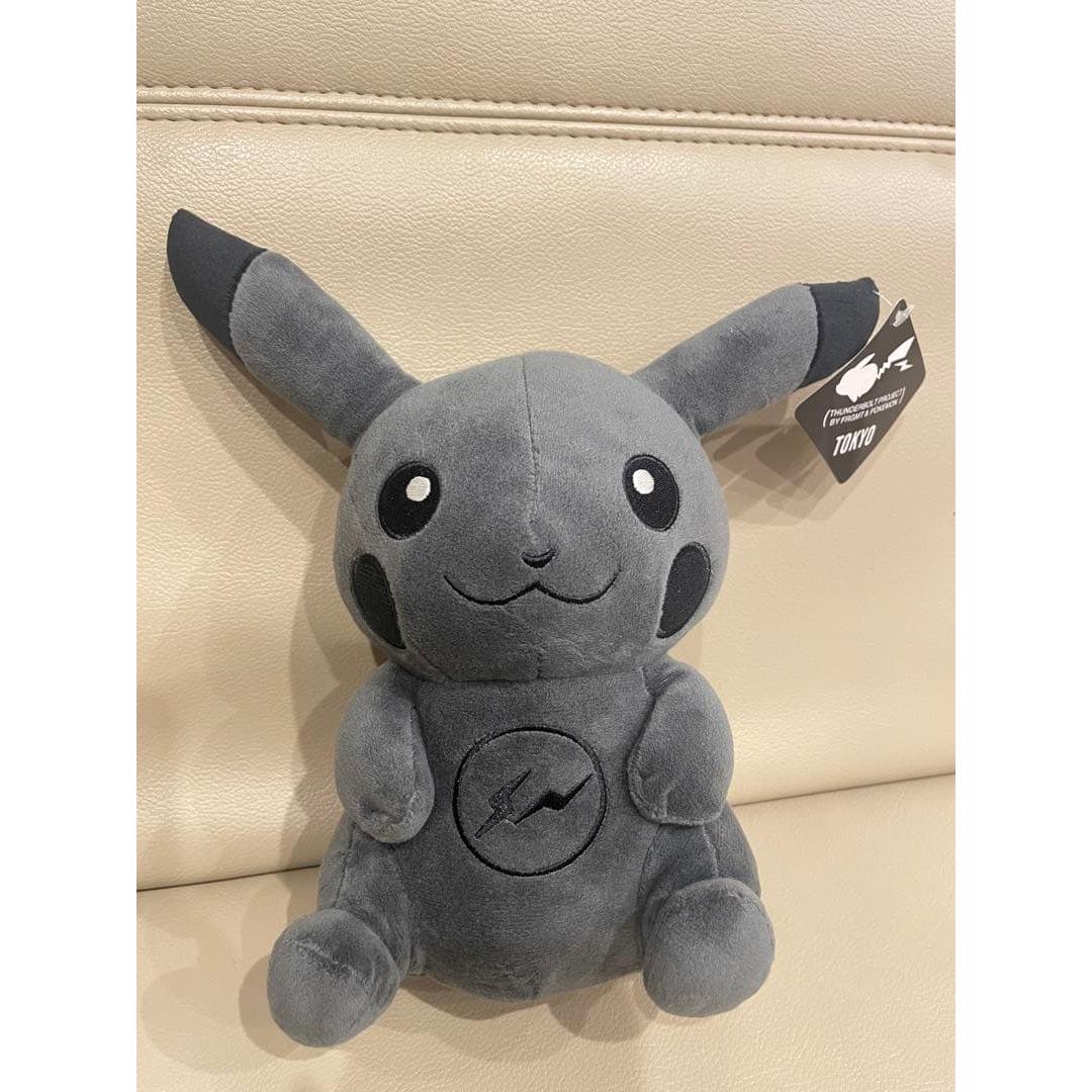 black pikachu stuffed toy