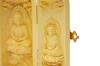 This natural boxwood (Tsuge) Buddhist triad features three Buddha figures: Shaka Nyorai, Amitabha Nyorai, and Yakushi Nyorai. Approximately 10cm tall.