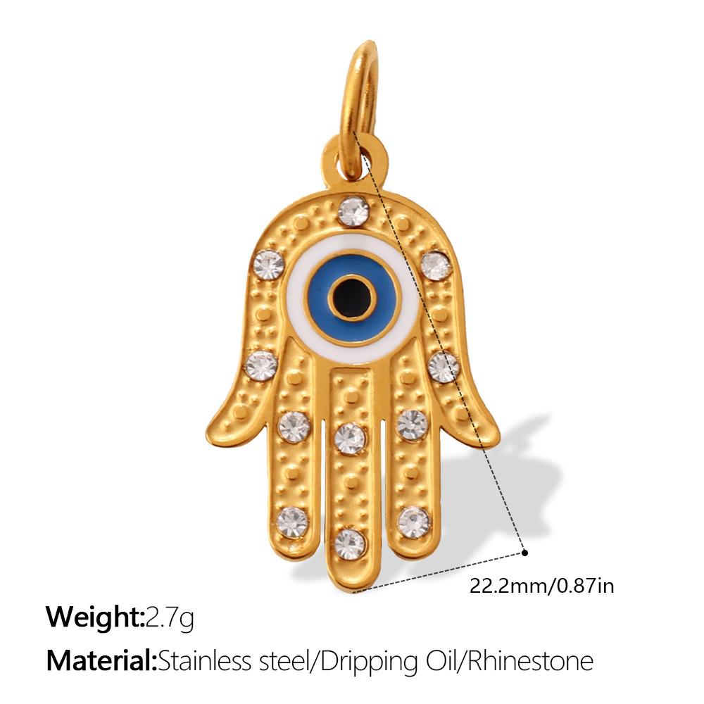 European and American retro exotic jewelry pendant golden Fatima hand evil eye element decorative pendant
