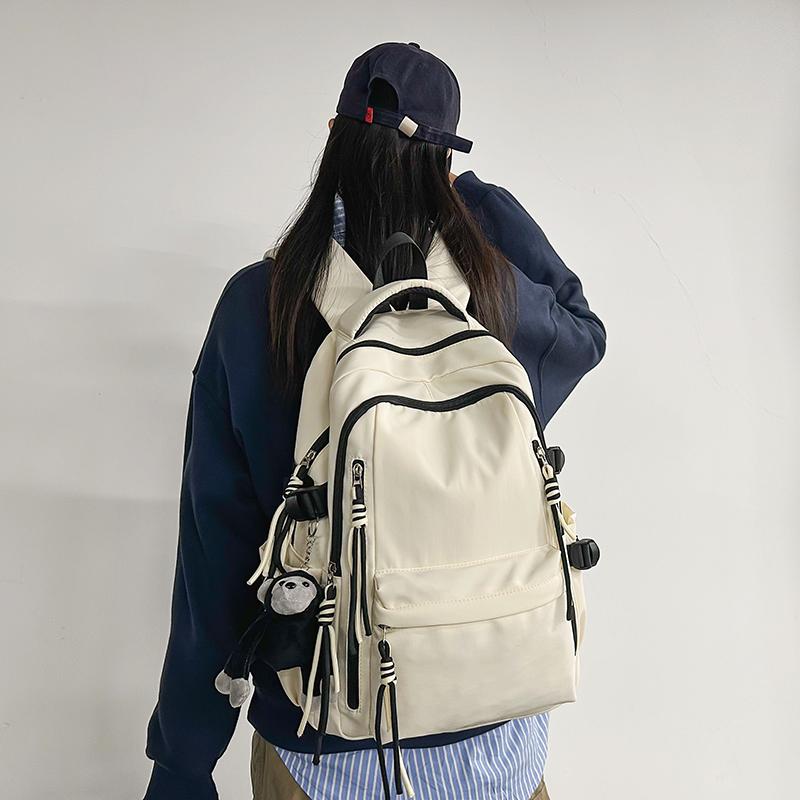 Ryggsäck för män i enfärgat utförande Ryggsäck för kvinnor med flera fickor Stor kapacitet Student Skolväska
