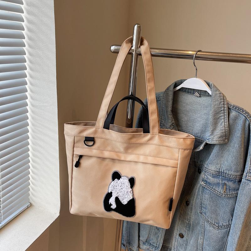 Casual large-capacity shoulder bag women's new fashion handheld cloth bag versatile class tote bag