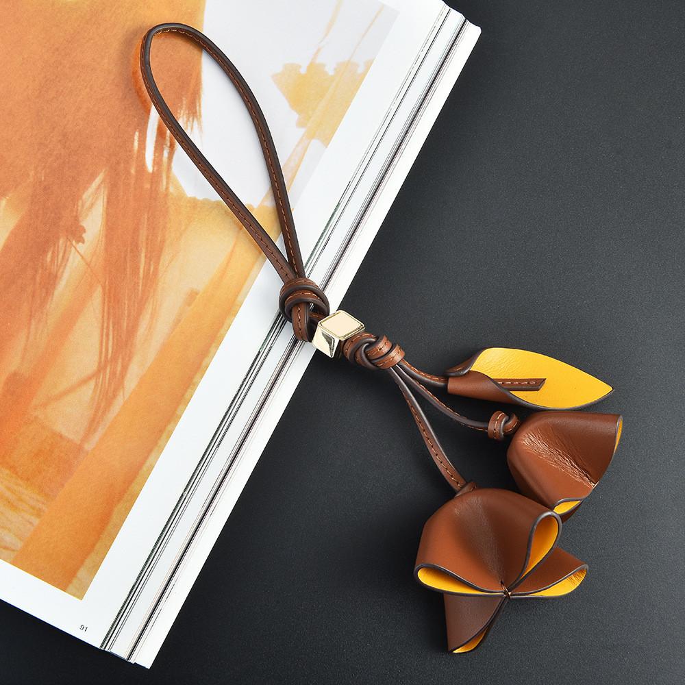 Moderne blumige Lederschlüsselanhänger für Damen-Taschen und Auto-Dekoration