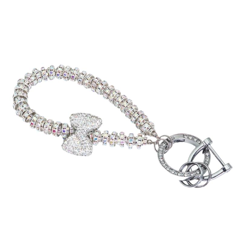 

Elegant Bowknot Keychain Featuring Full Rhinestones Designing Chic and Luxurious Ornament for Fashion Forward Women білий