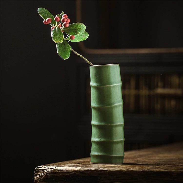 Zen Bamboo Joint Wall Hanging Vase: Ceramic Flower Holder for a Simple, Creative Arrangement.