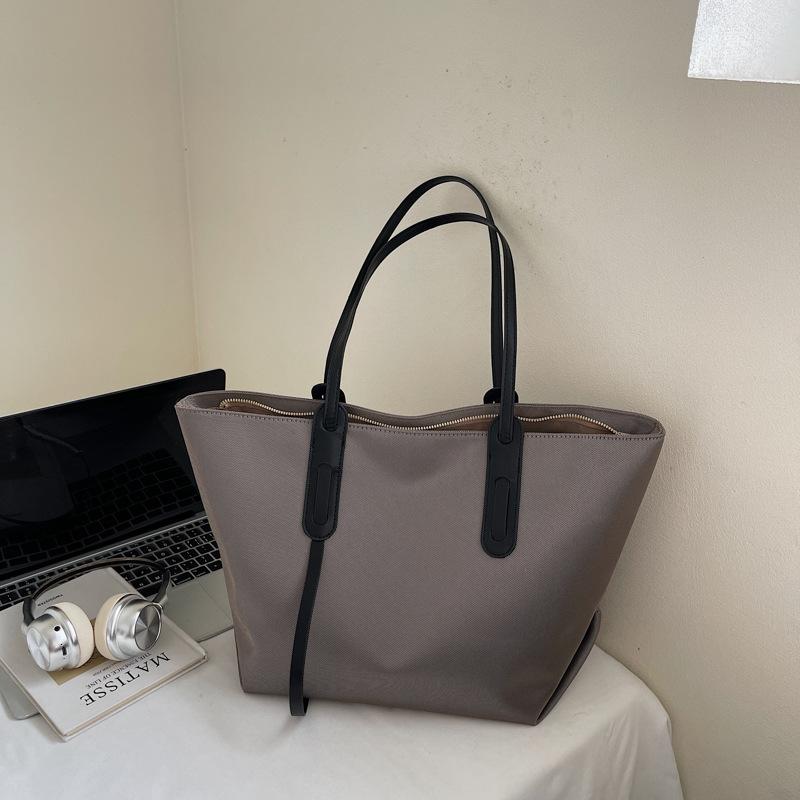 

Корейская версия высококачественной сумки-тоут женская большой вместимости 2025 новая простая повседневная сумка через плечо текстурная сумка-подмышка для通勤