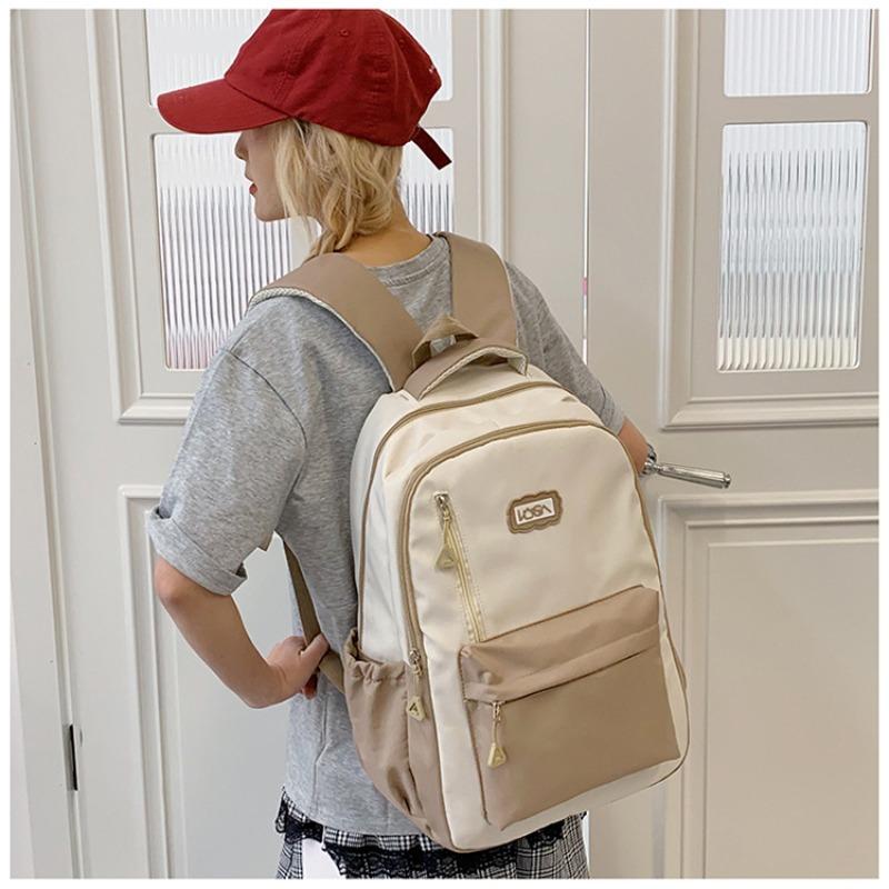 Leisure niche simple new nylon versatile large capacity double shoulder contrasting color commuter travel backpack